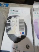 Fit Bit Inspire fitness tracker, powers on, comes in original box with charger