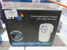 BT wifi extender 1200 dual band wifi extender, powers on but we havent checked it any further, boxed