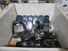 A box of approx 11x BT Home smart phones all missing power cables but have docks and 8 various BT