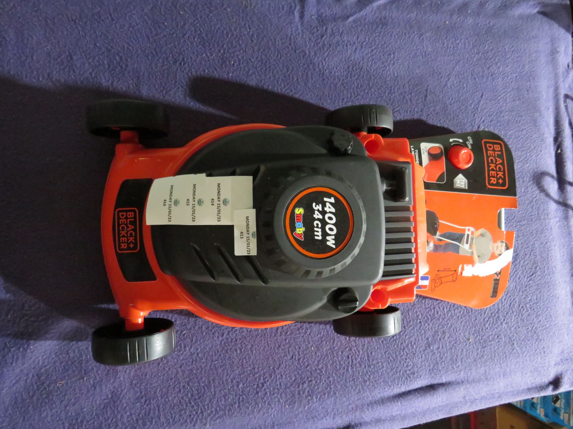 Black & Decker - 14000w 34cm Toy Lawn Mower - New.