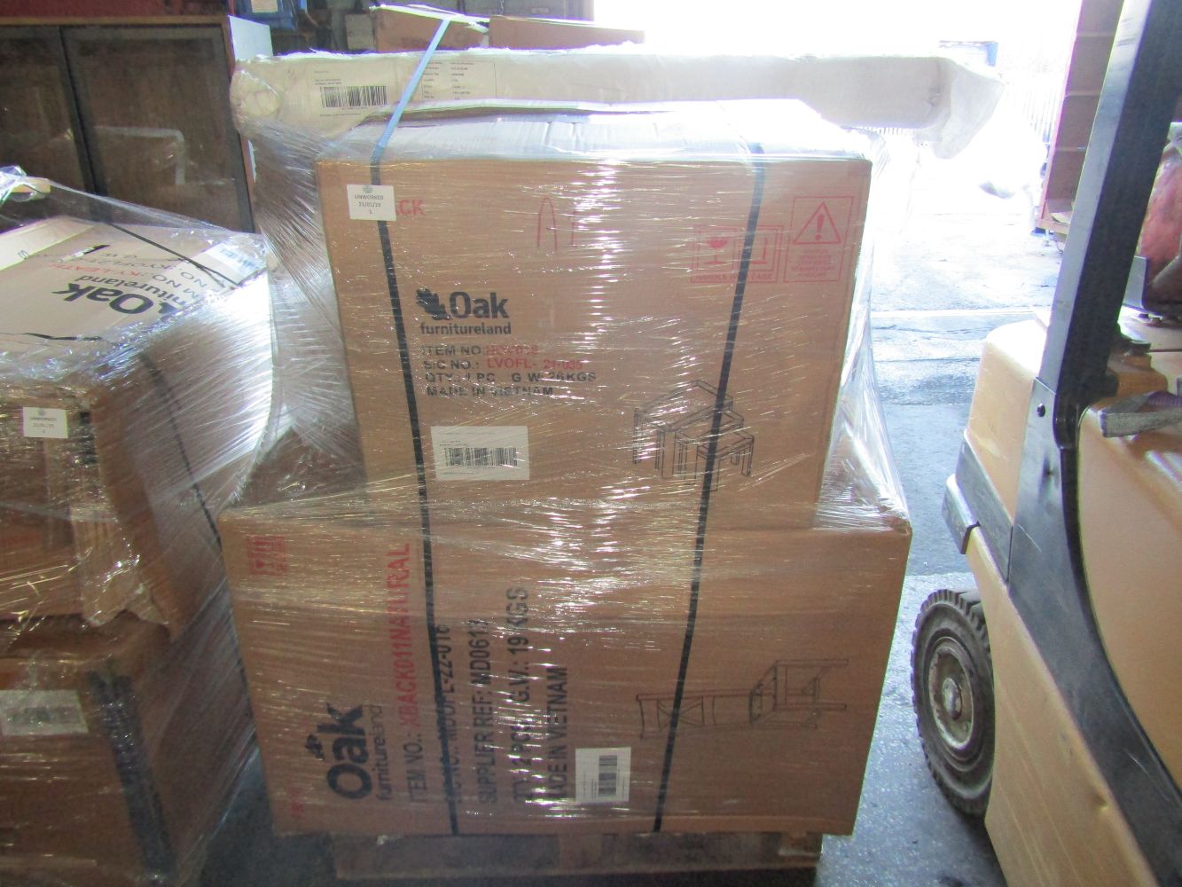 Pallets of of unworked Oak Furniture land raw returns Furniture