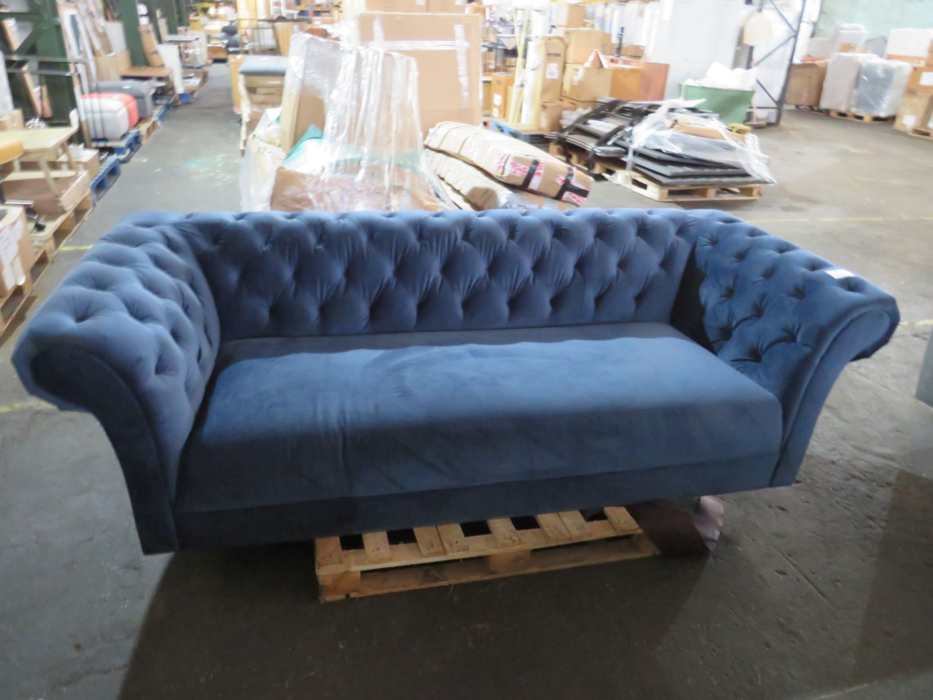 Oak Furnitureland Montgomery 3 Seater Sofa In Navy Velvet. no feet and the fabric is torn on the