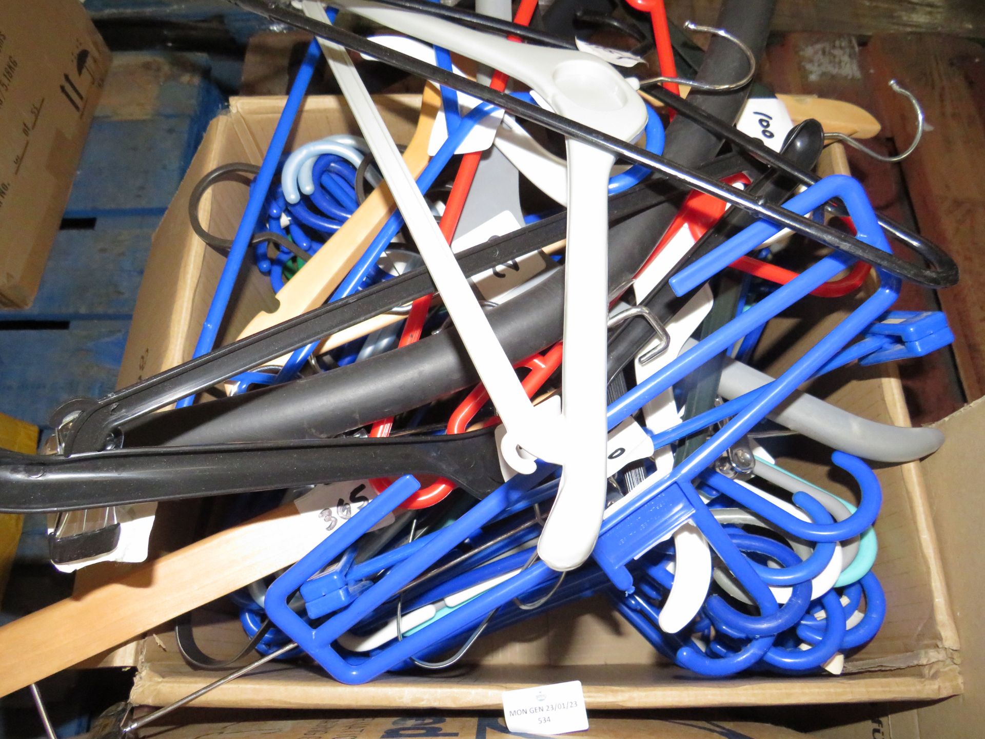 1x Box Containing Approx 65x Assorted Hangers - Used Condition.