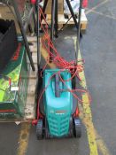 Bosch Rotak 320 ER lawn mower, tested and working as in the blade spins (we haven't actually cut any