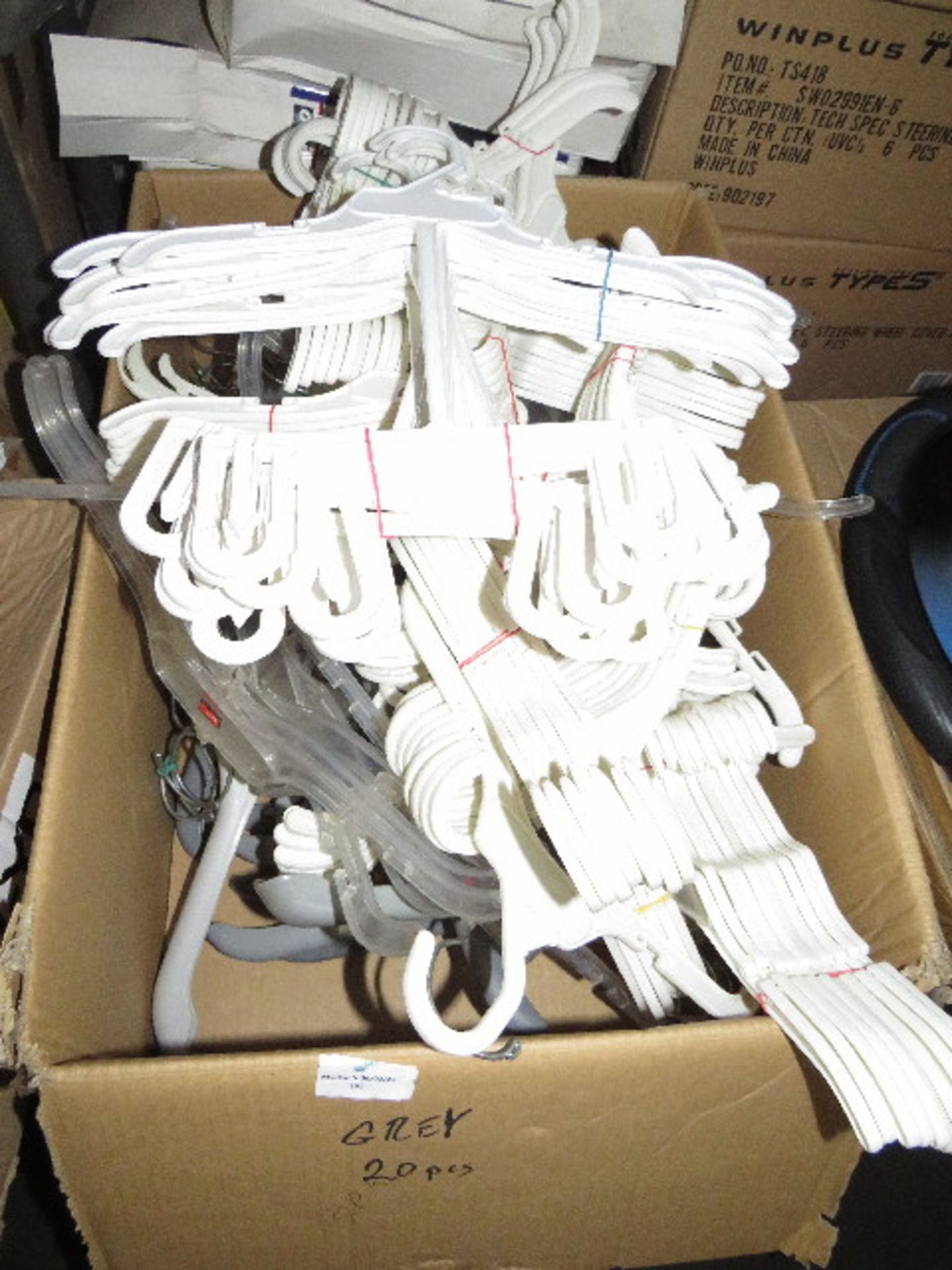 1x Box Containing Approx 100+ Assorted Hangers - No Packaging.