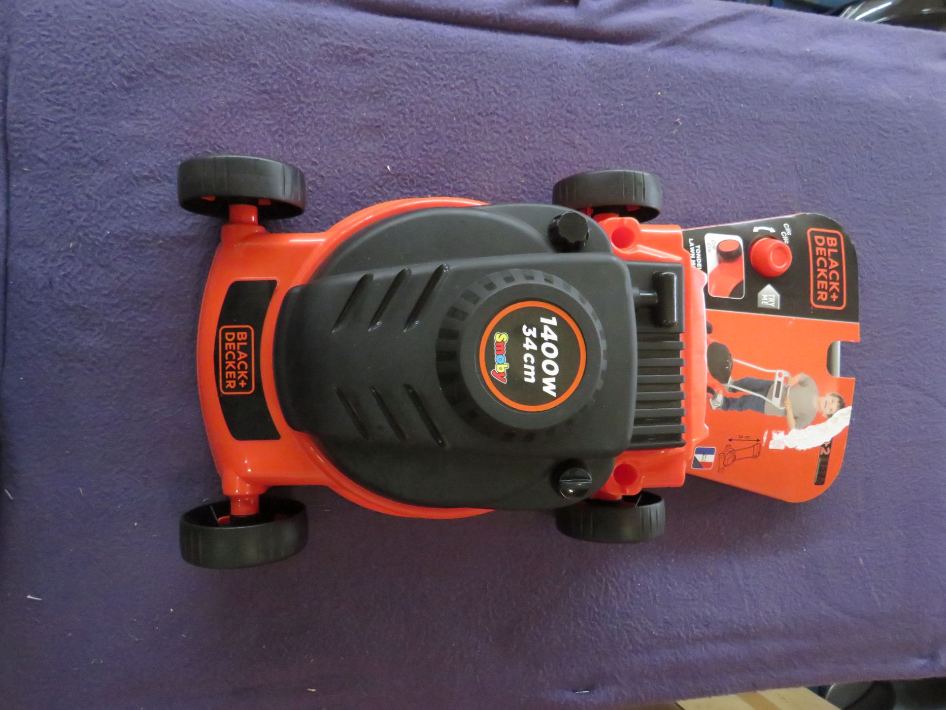 Black & Decker - 1400w 34cm Toy Lawn Mower - New.