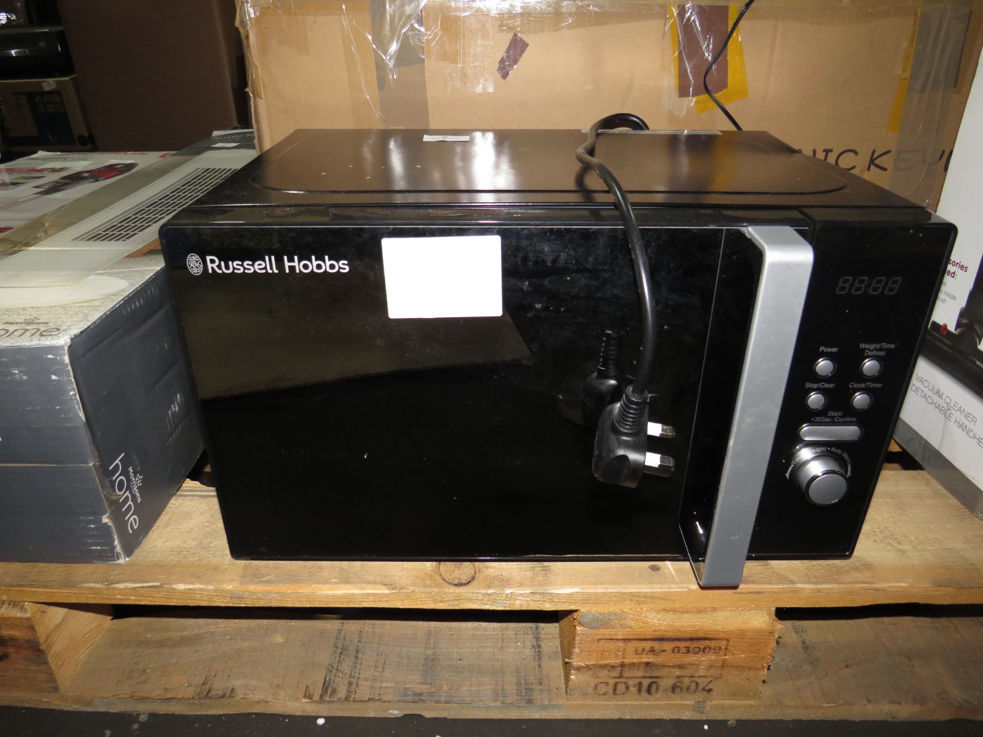 russell hobbs Black digital microwave, tested wrolking for heat on a short cycle, has a dent on