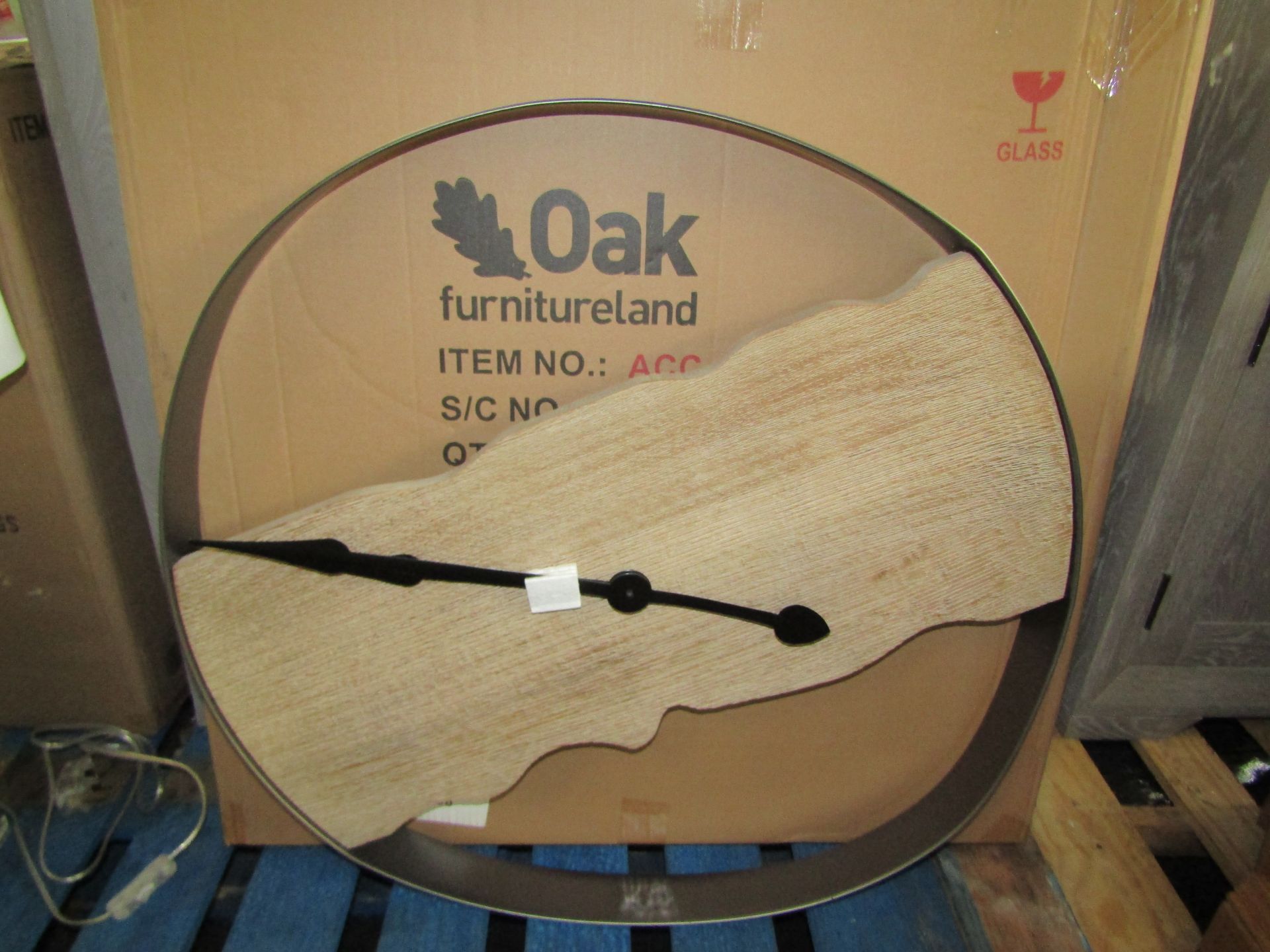 Oak Furnitureland Jackson Wall Clock RRP Â£79.99 SpecificationsWidth: 71.1cmHeight: 71.1cmDepth: