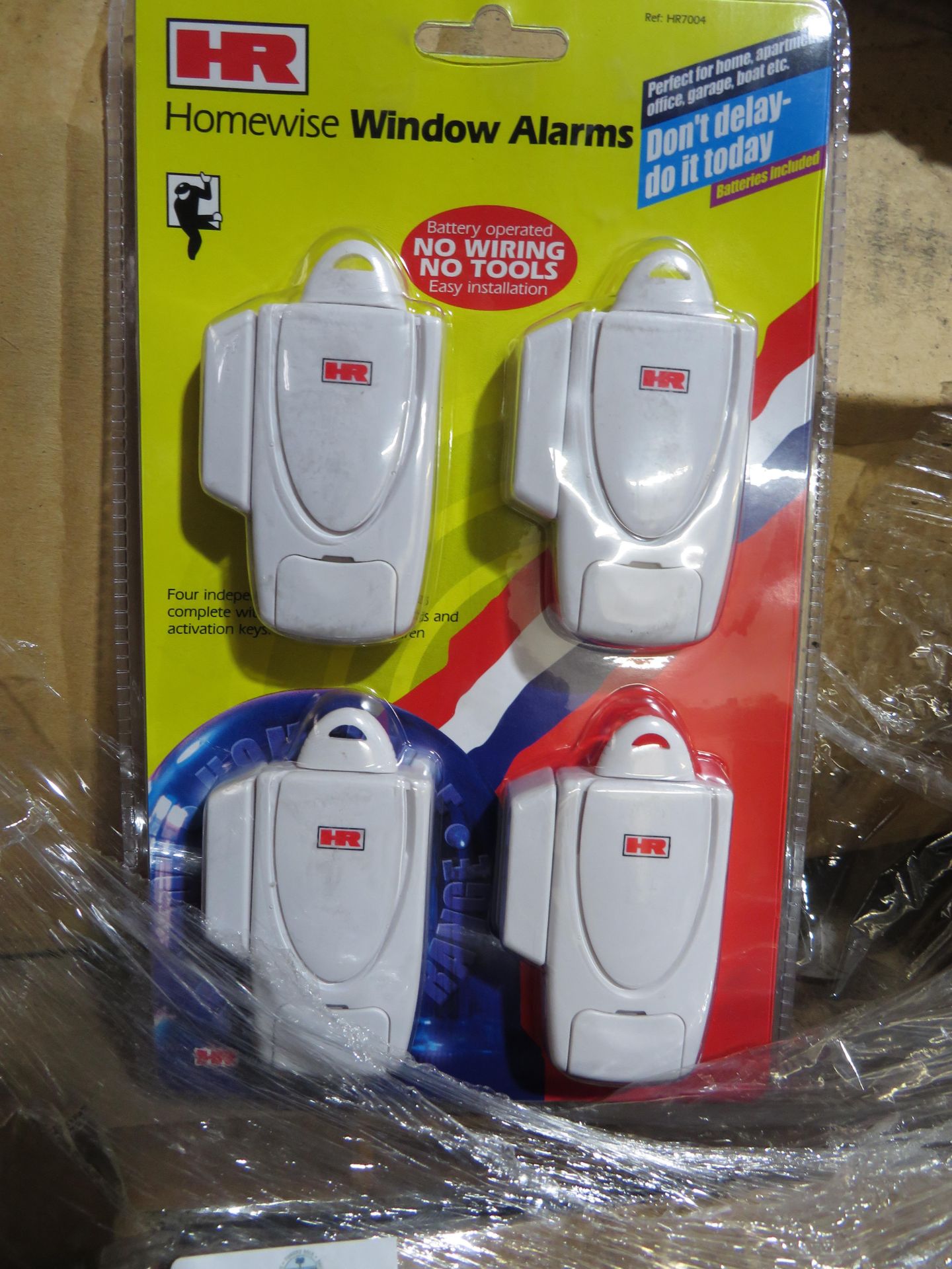 Box of 40x packs of 4 home wise window alarms, still sealed in packaging.