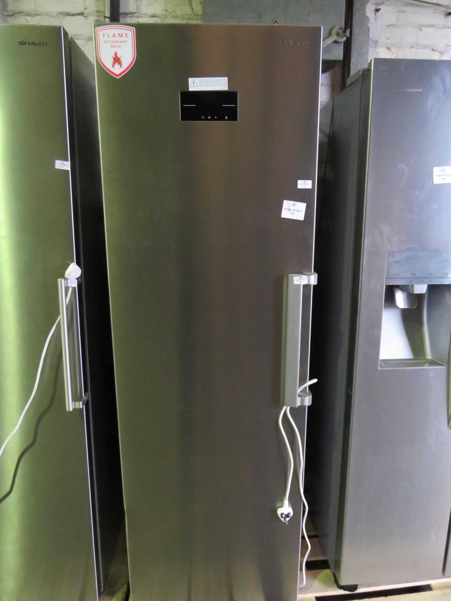 Sharp Stainless Steel Tall Freestanding Freezer - Awaiting condition report.