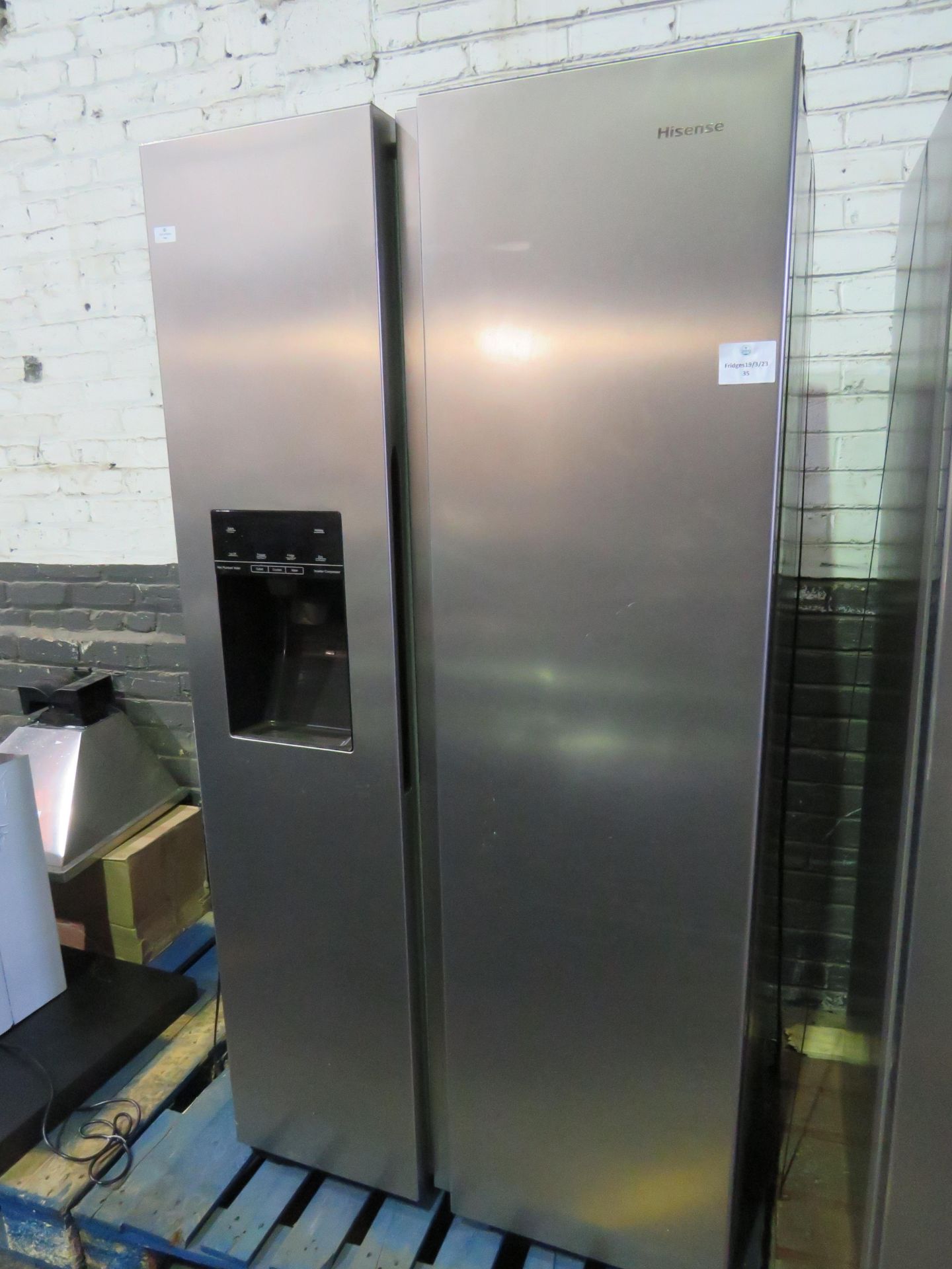 American Fridge freezer with water dispenser, testd and workignm for coldness, we havent checked the