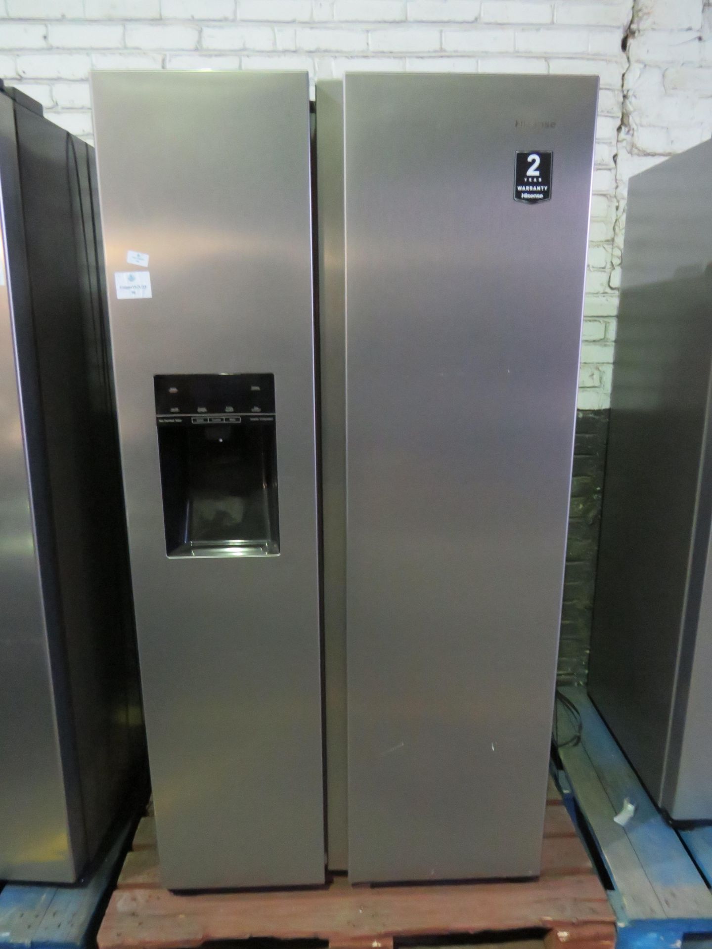 American Fridge freezer with water dispenser, testd and workignm for coldness, we havent checked the