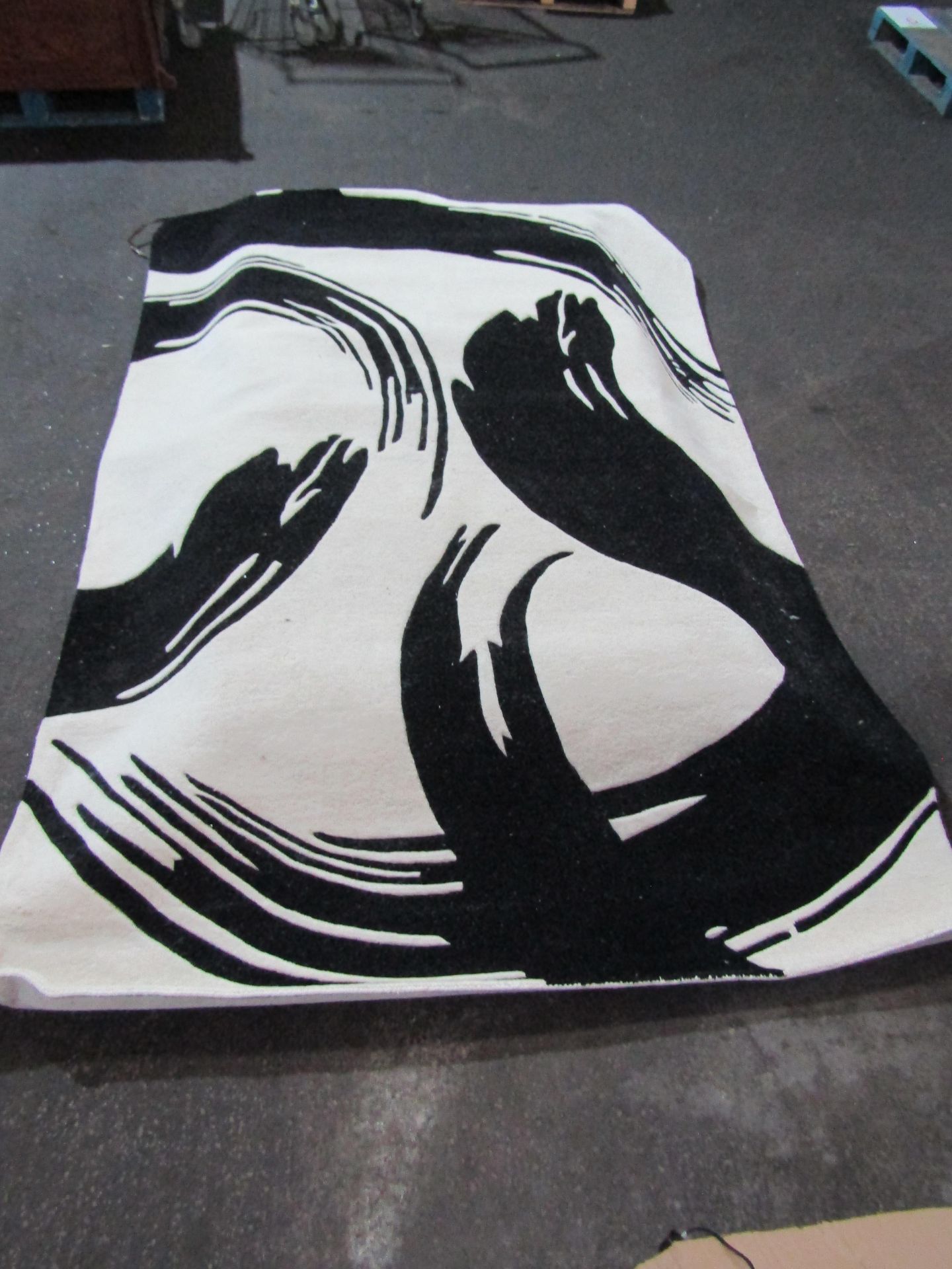 Mirage Rectangle Rug 200X290cm Cream and black RRP ??239.00Striking swirl designOn trend coloursHand