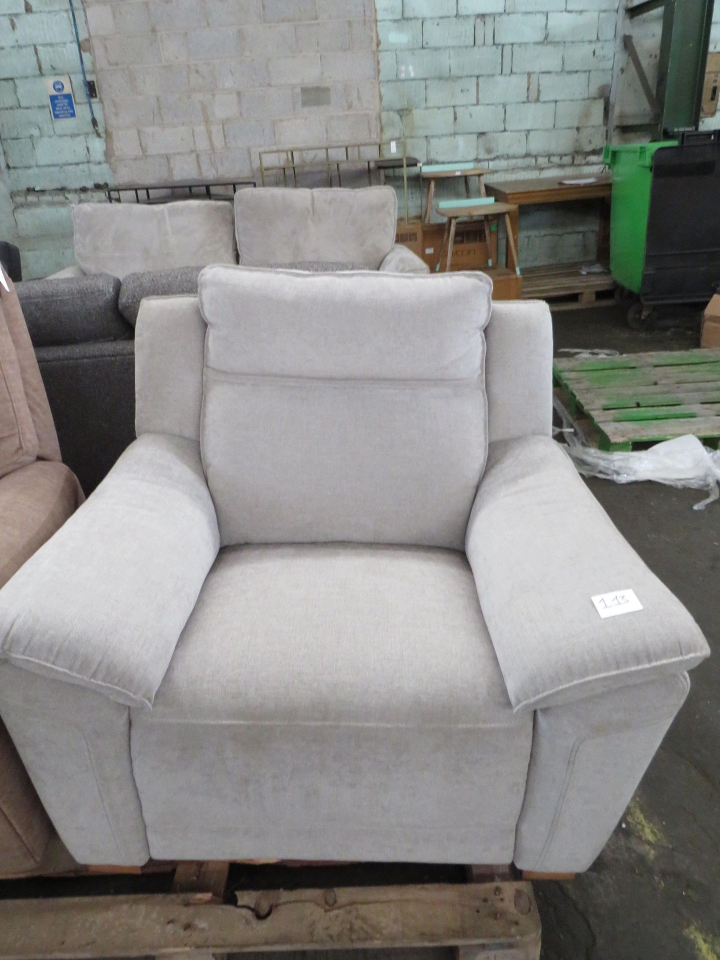 Oak Furnitureland Dune Armchair in Sense Light Grey Fabric RRP 699.99Chair arrived with transit