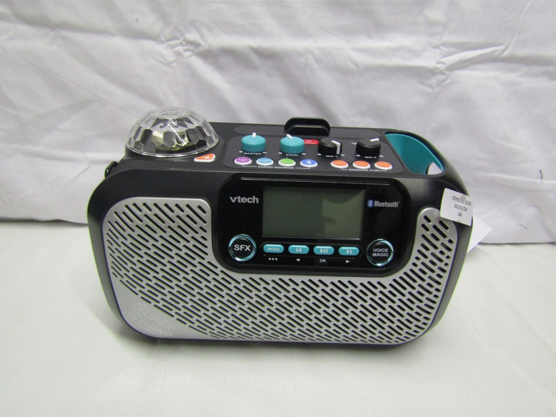 Vtech Bluetooth karaoke system , powers on but needs charging, we haven't checked any further