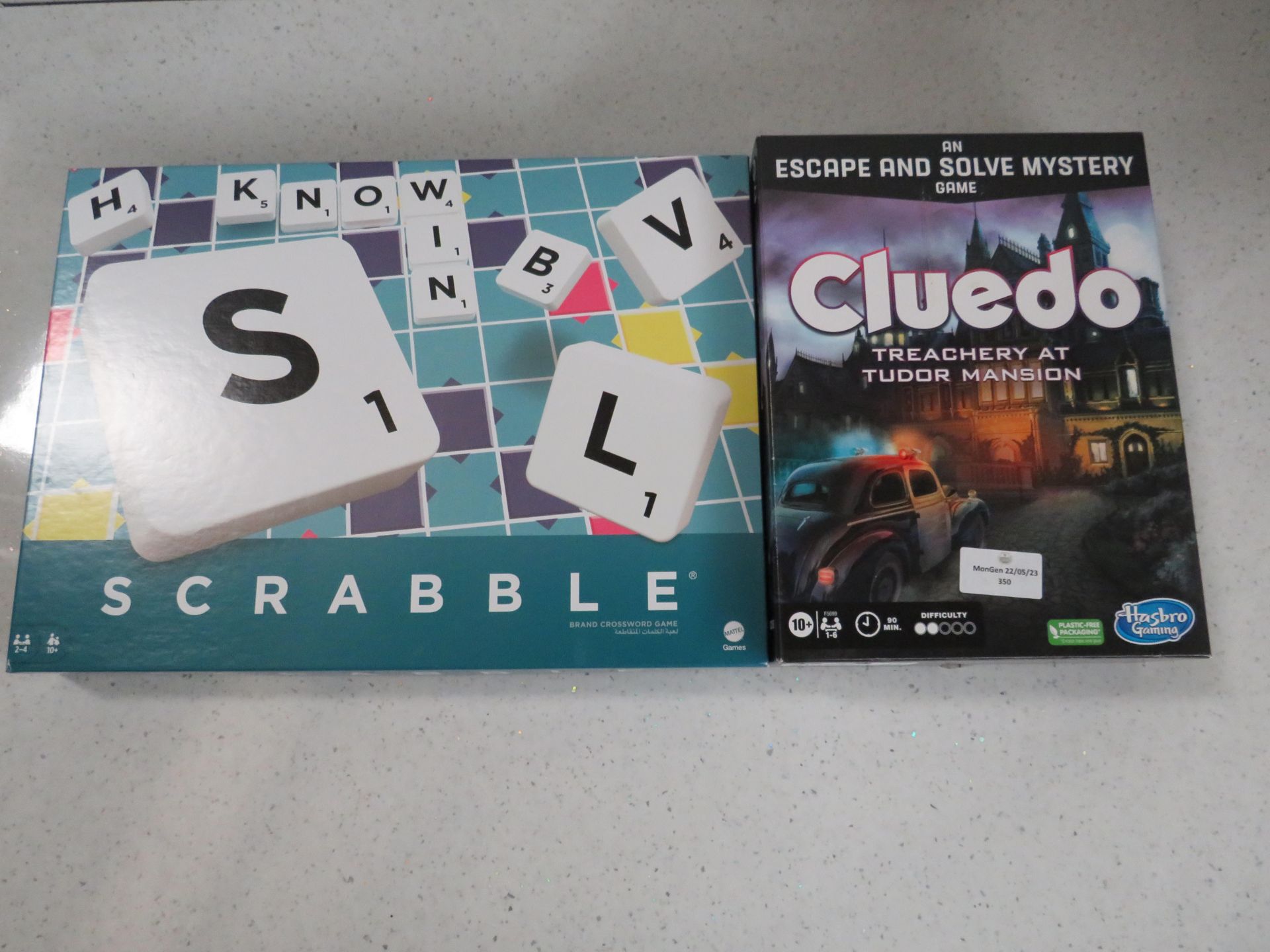 1x Mattel Games - Scrabble Crossword Game - Unchecked & Boxed. 1x Hasbro - Cluedo Treachery at Tudor