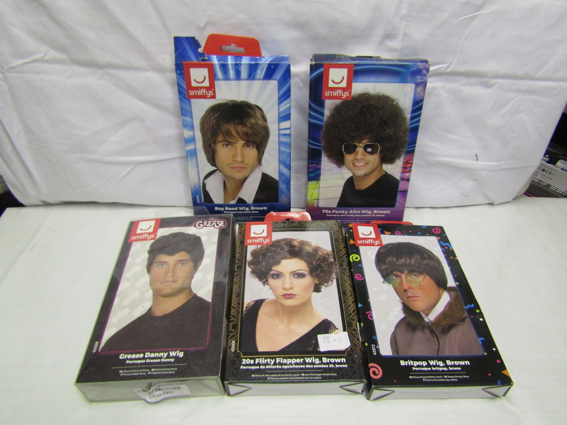 5x Various wigs including 90's Brit pop, 20's flapper, 70's afro and more