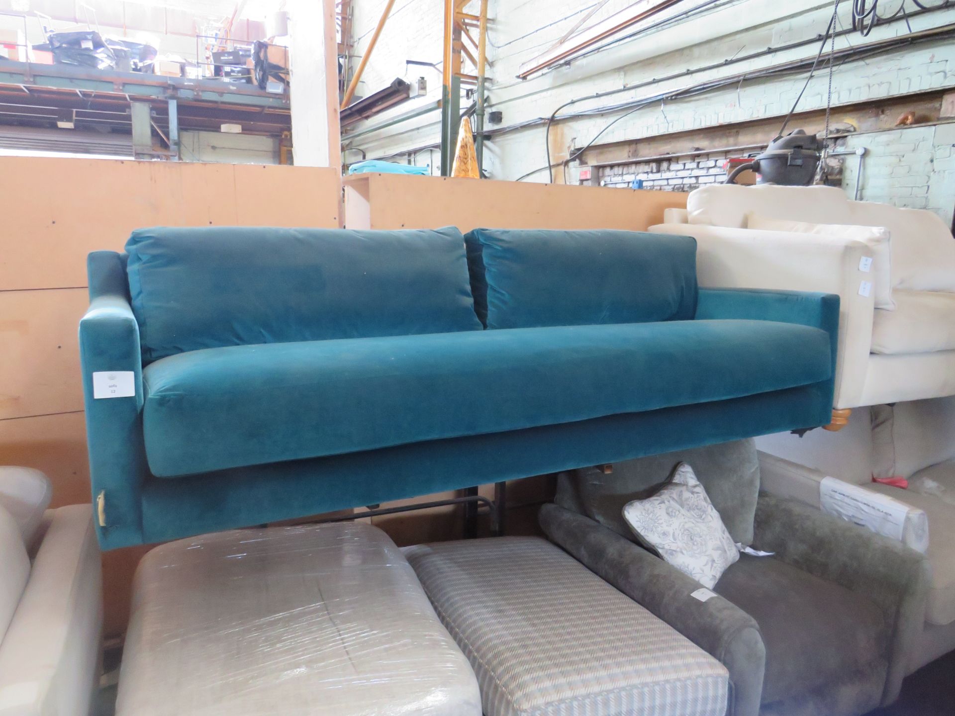 Swoon 3 seater sofas, has a rip on the front arm