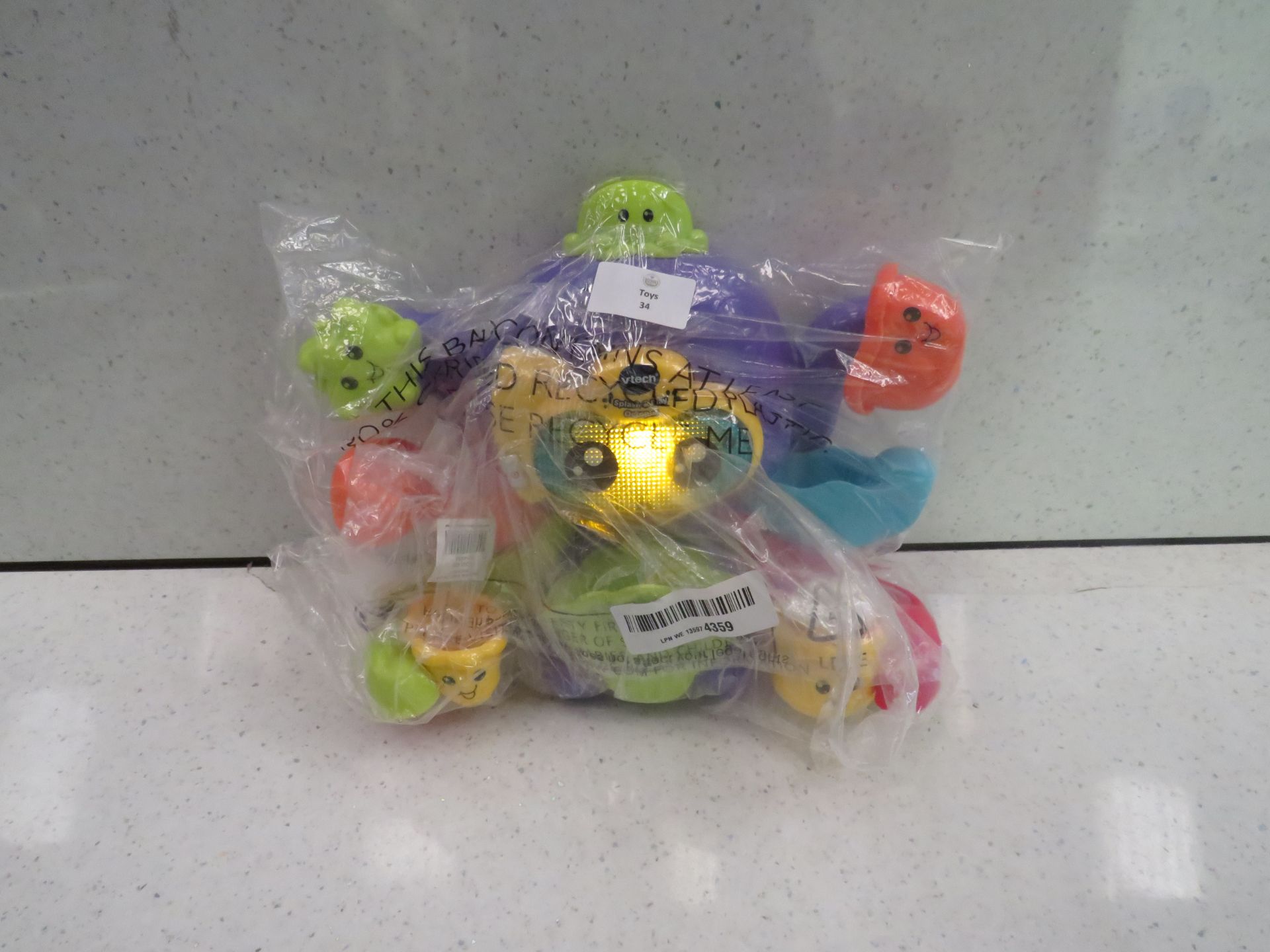 Vtech splash & play octopus toy - Powers on & Packaged.
