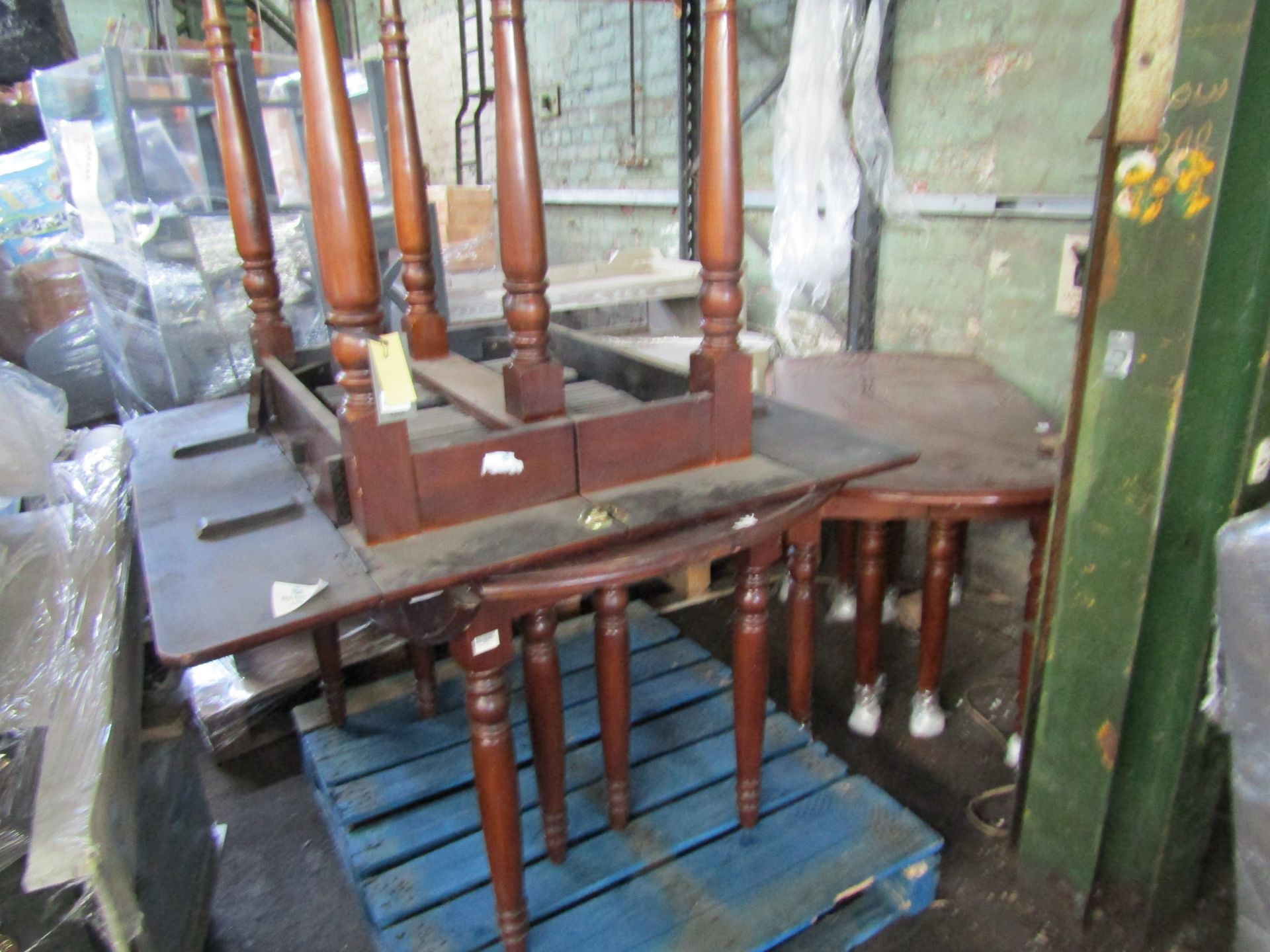 Pallet of 3 solid wood extending drop leaf dining tables. All need a sand down and varnish but are