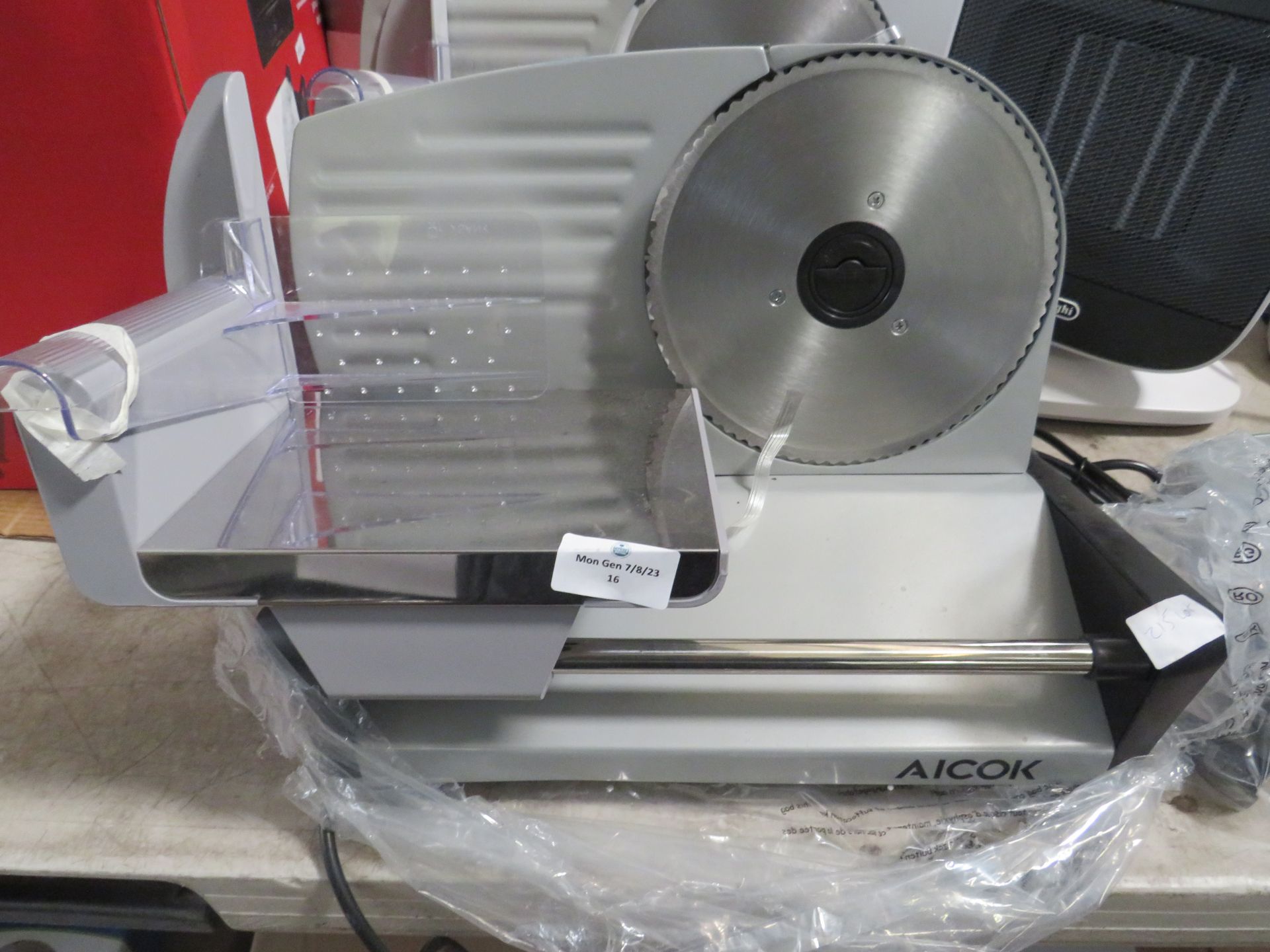 Aicok electric meat slicer, tested working for thr blade turning, we havent cut any meat with it