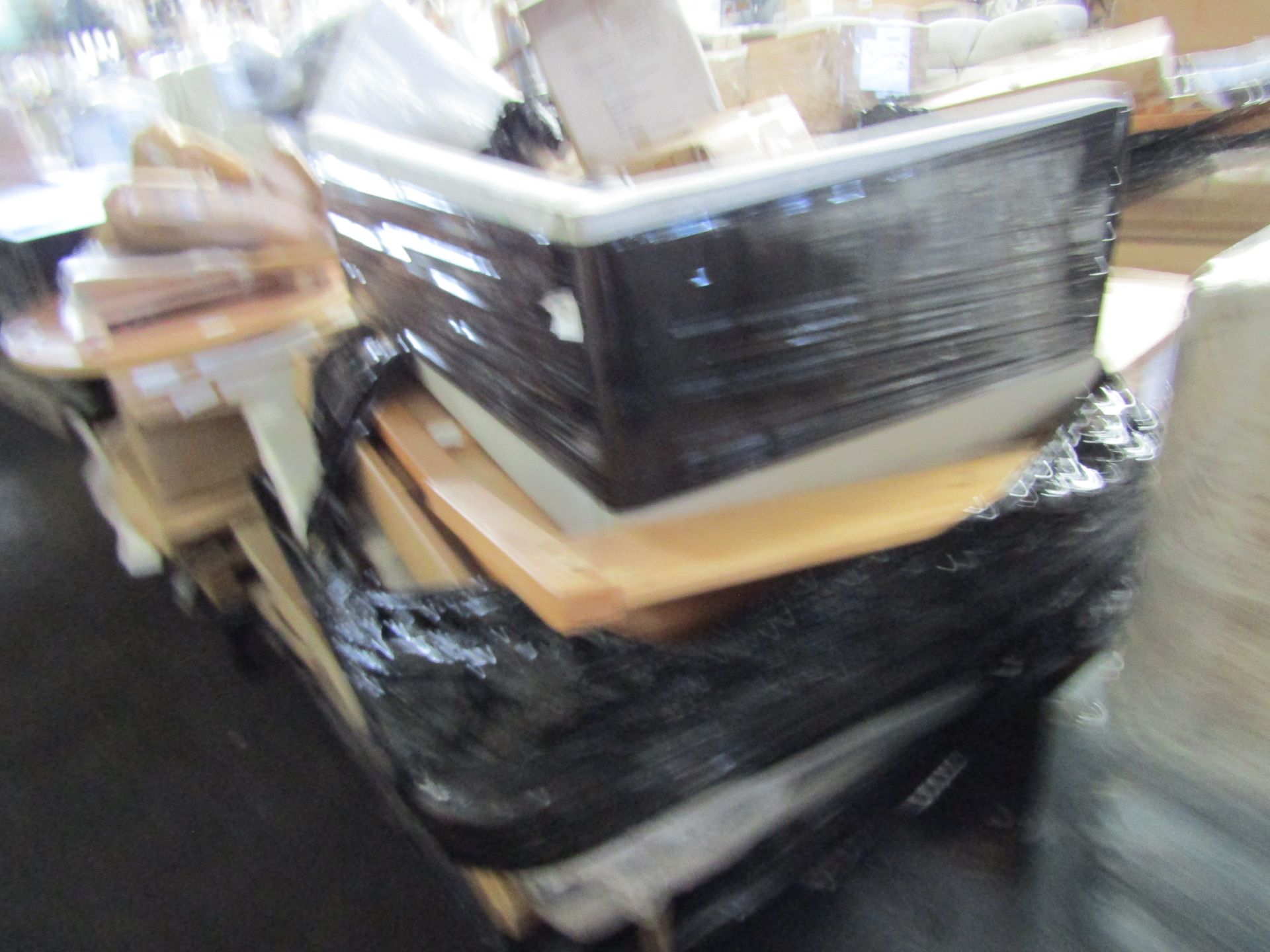 Pallet of sofa parts and unmanifested furniture items