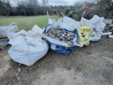 (11) bags of partially used bags of paving blocks