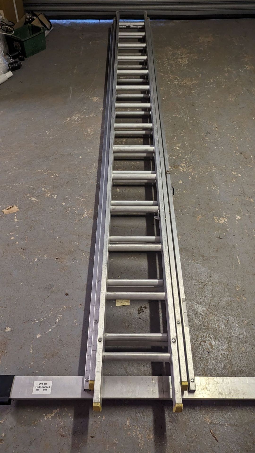 Lyte three section extension ladder with stabiliser bar