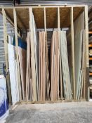 Large quantity of sheet timber stock in racking to include: