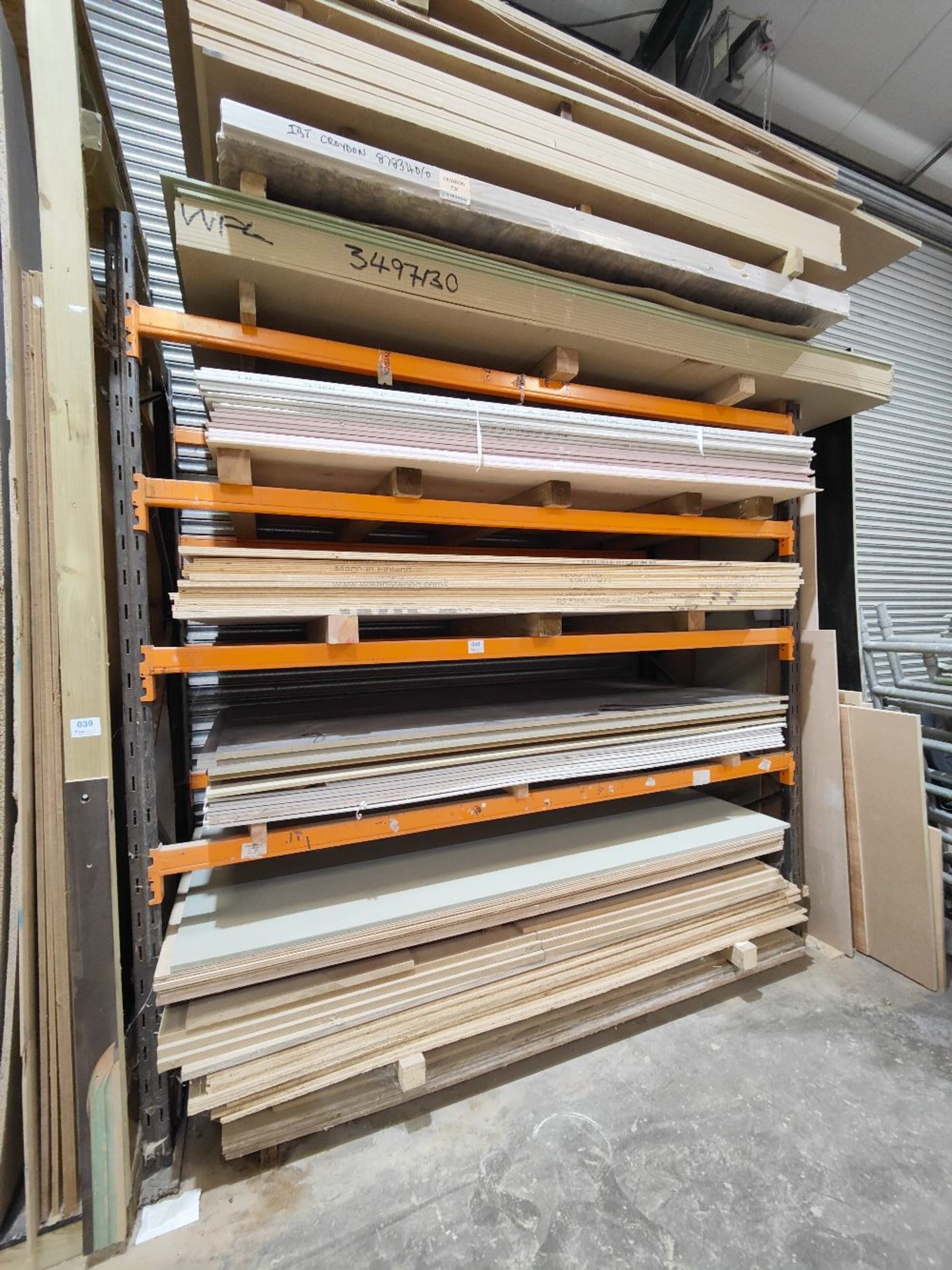 Large quantity of sheet timber stock in racking to include: - Image 2 of 9