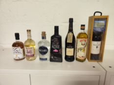 (7) Bottles of various spirits to include: