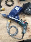 Makita 110v hand drill with Quikpoint Mortargun attachment