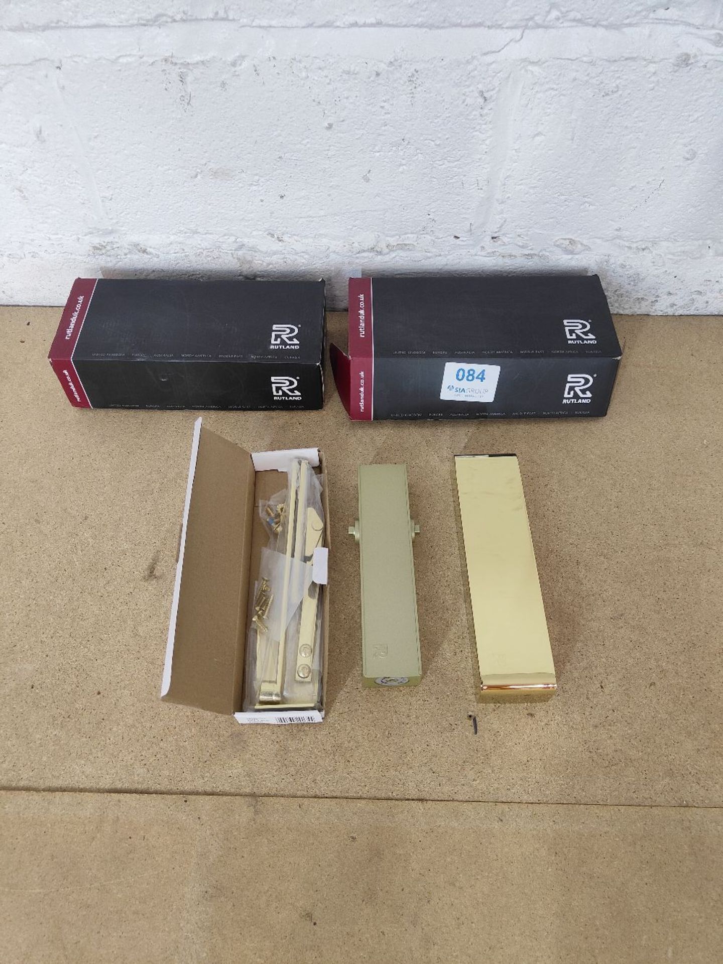 (2) Rutland polished brass architectural door closers