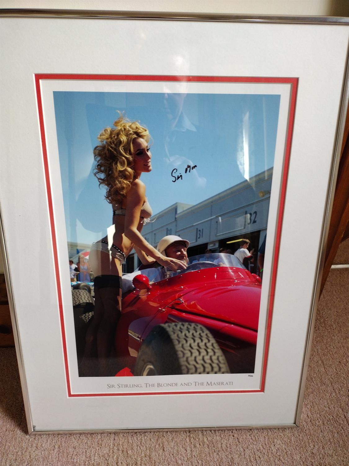 'Sir Stirling, the Blonde and the Maserati'. Signed by Sir Stirling Moss OBE - Image 2 of 3