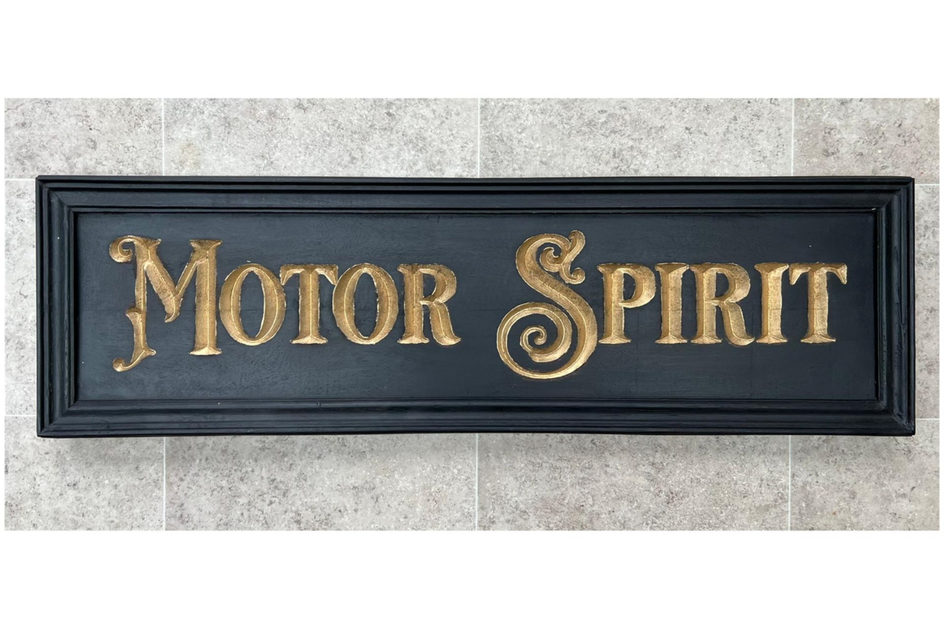 A Beautiful Hand-Carved Wooden 'Motor Spirit' Wall Sign