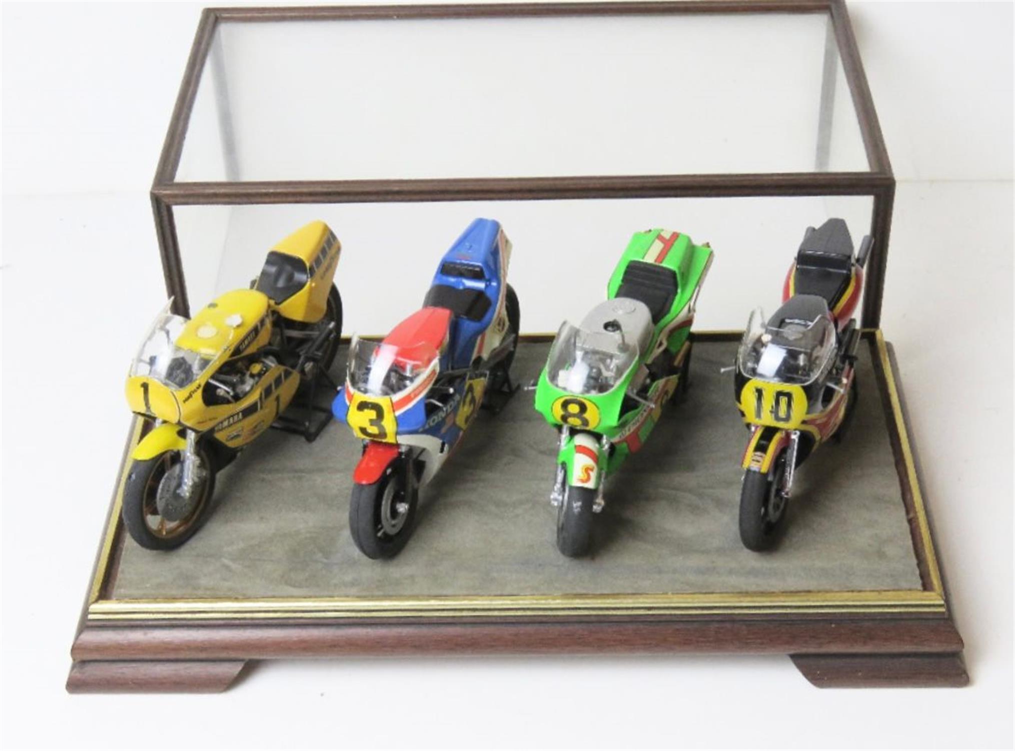 A Set of Four 1:12 Scale Moto GP Bikes from Tamyia Assembled and Cased.