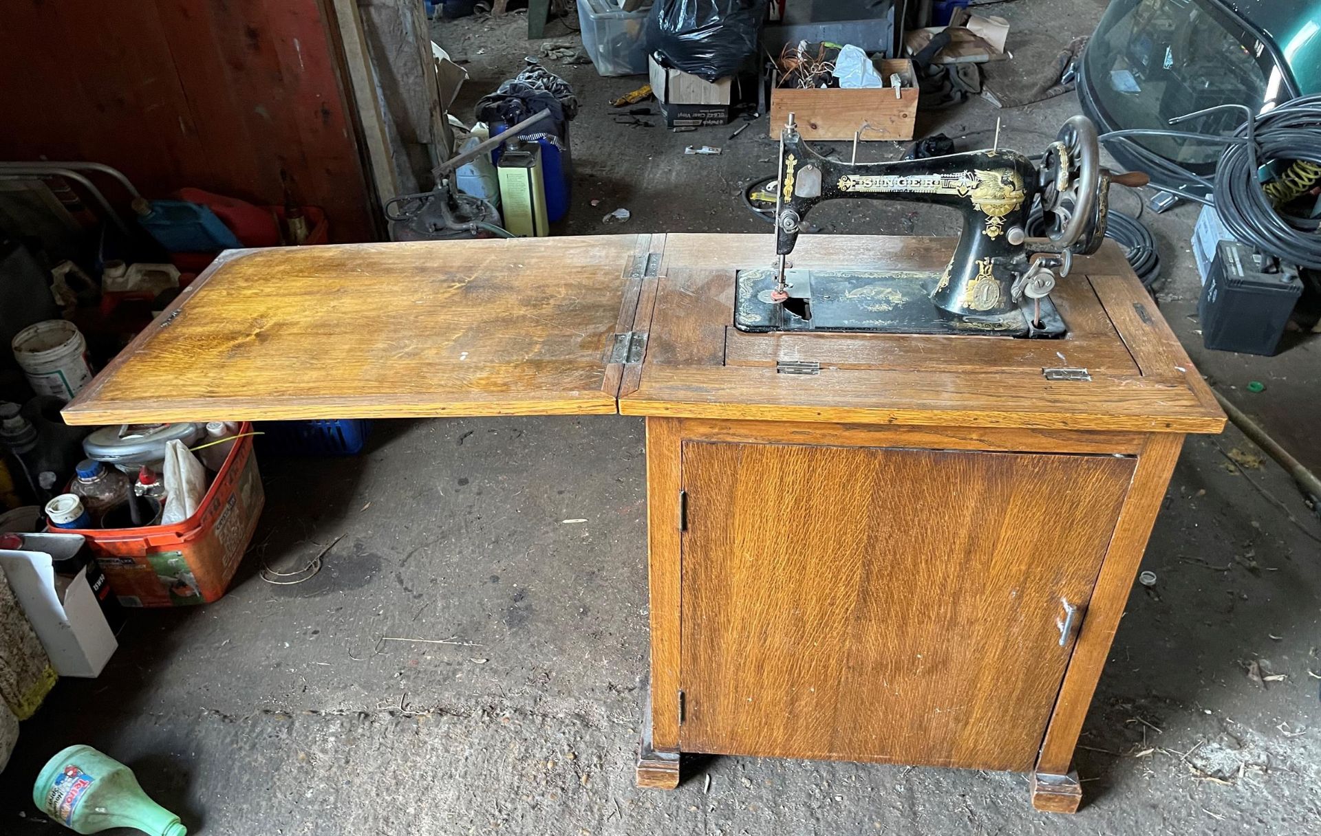 Singer Sewing Machine in Cabinet