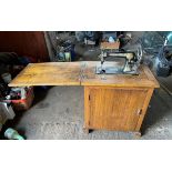 Singer Sewing Machine in Cabinet