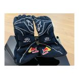 A Pair of Red Bull Gloves signed by Sebastian Vettel