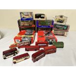 Eight boxed diecast buses together with nine diecast buses