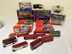 Eight boxed diecast buses together with nine diecast buses
