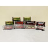 Ten Exclusive First Edition 1:76 diecast model buses in presentation boxes.