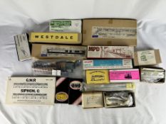 A quantity of plastic and metal model kits, to include railway coaches and an MPD 0-6-0 loco kit