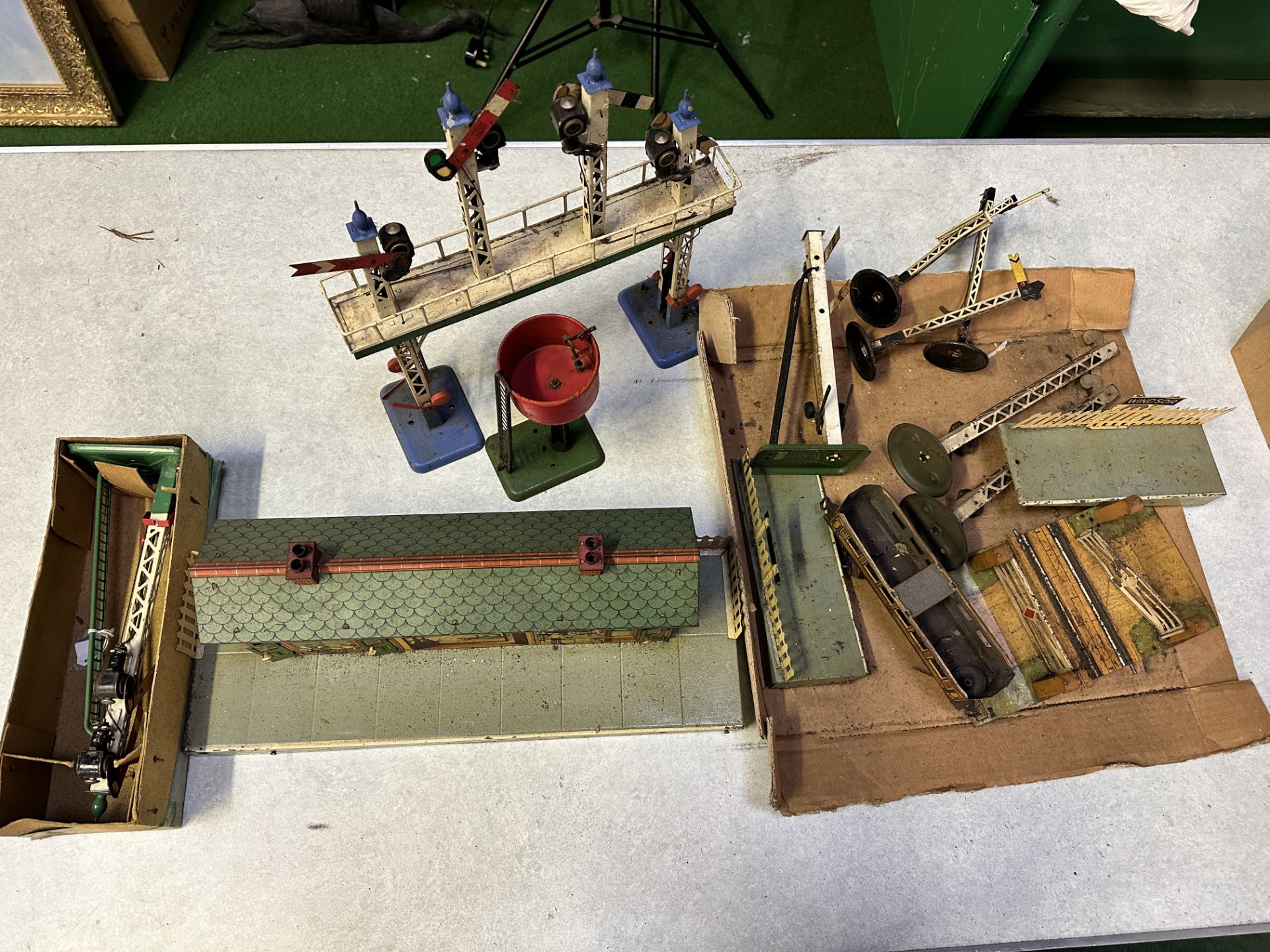 Tin plate model station, together with other Hornby and Meccano accessories