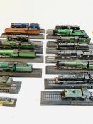 Collection of 16 plastic model steam engines and locomotives.