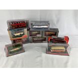 Ten diecast model buses in original packaging