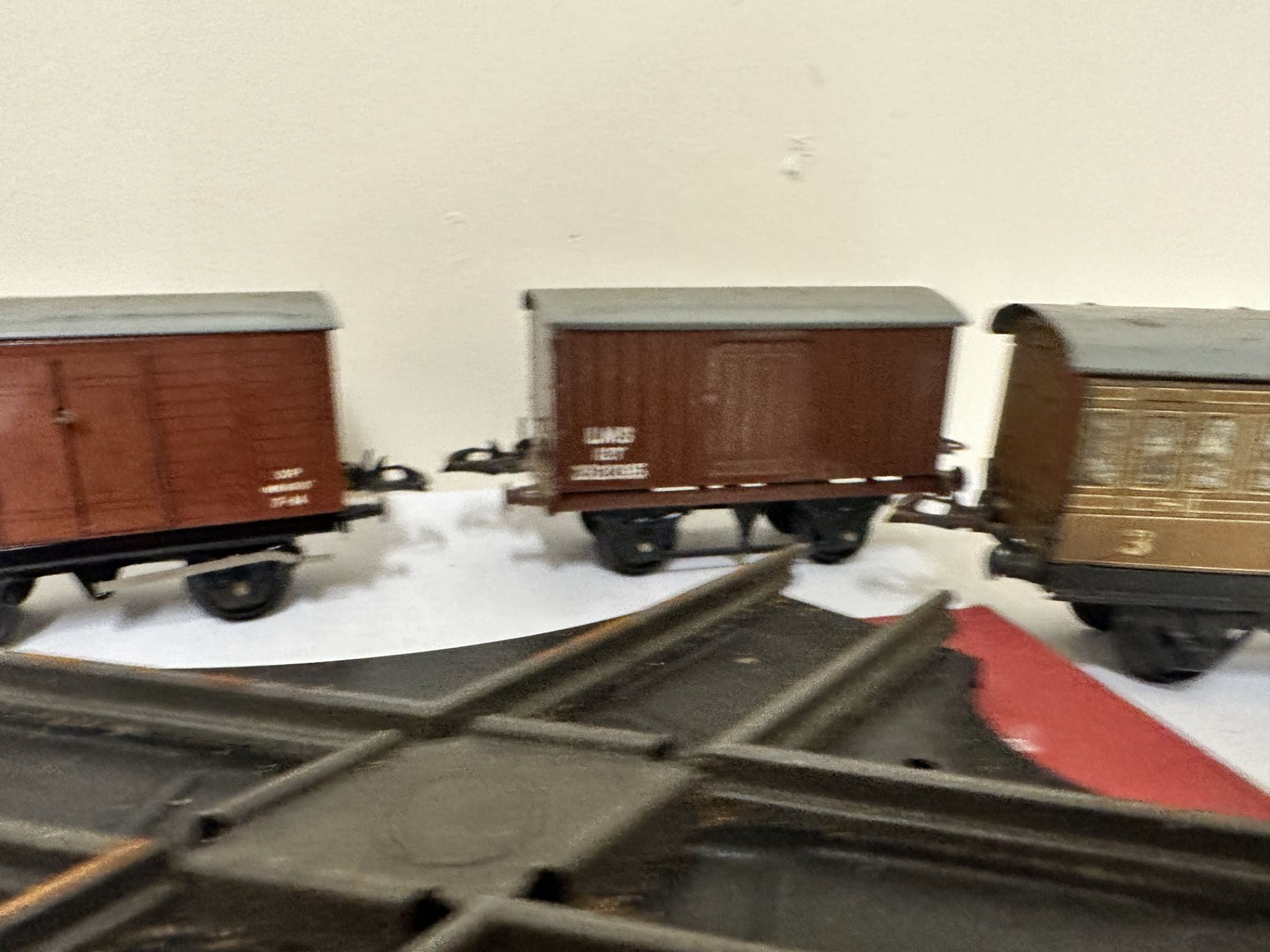 Two Hornby 0 gauge coaches, two wagons and acute angle crossing - Image 3 of 5