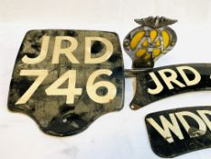 AA badge no. 6B58370; motorcycle rear number plate; and two motorcycle front number plates.