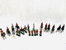 Collection of painted metal soldiers, mainly calvary