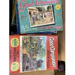 Twenty two opened Good Companion jigsaw puzzles